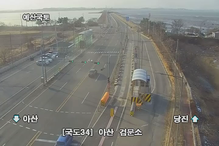 I2V 입력 이미지: 국도34 아산 검문소 CCTV